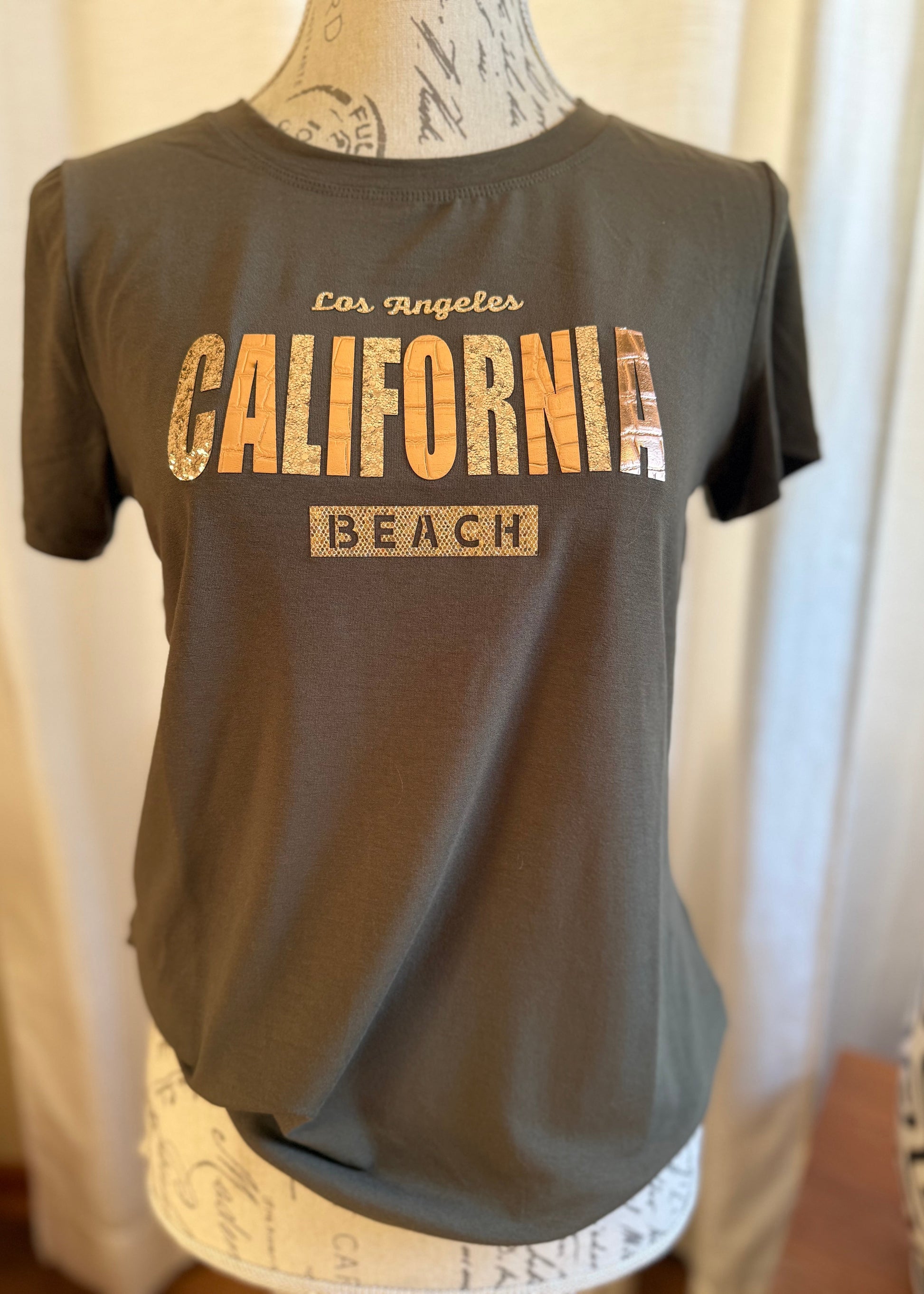 Polera Letras Doradas